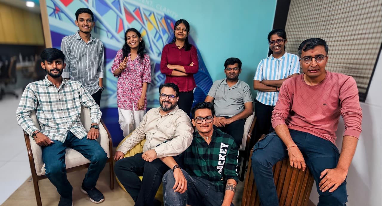 ANXZONE team collaborating in a modern studio